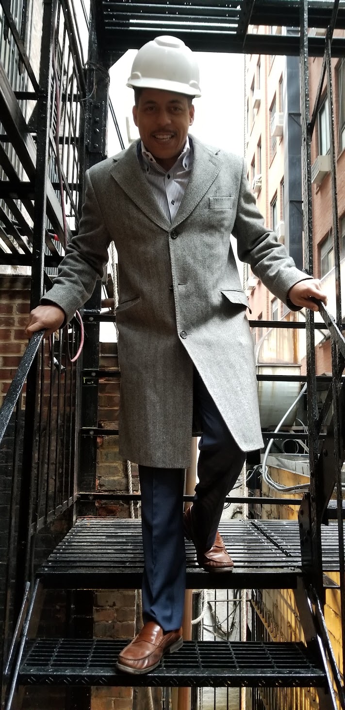 Aubrey Phillibert, founder and president of Kellets, on scaffolding at a New York City building