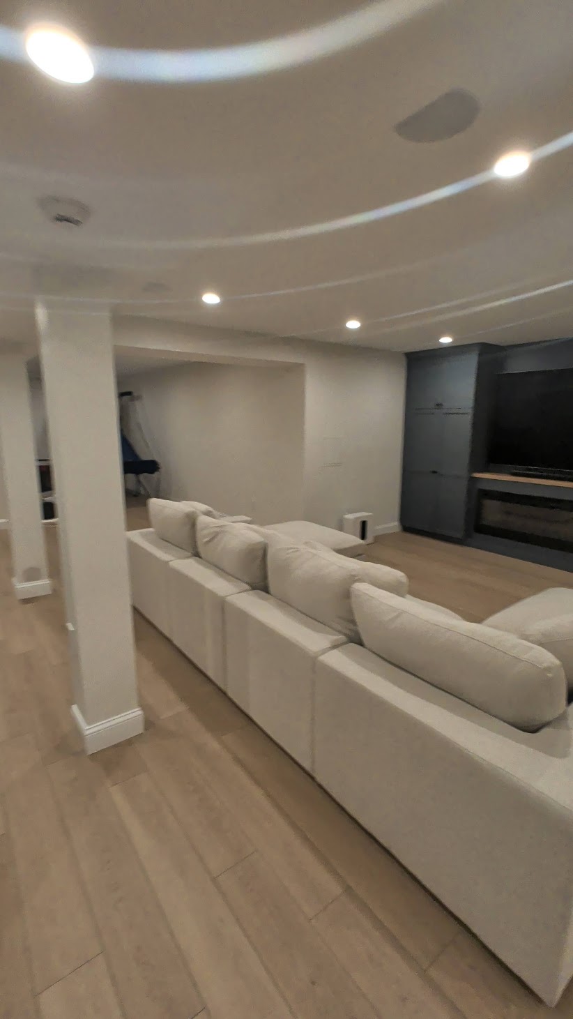 Vertical view across a completed Kellets lower-level family room