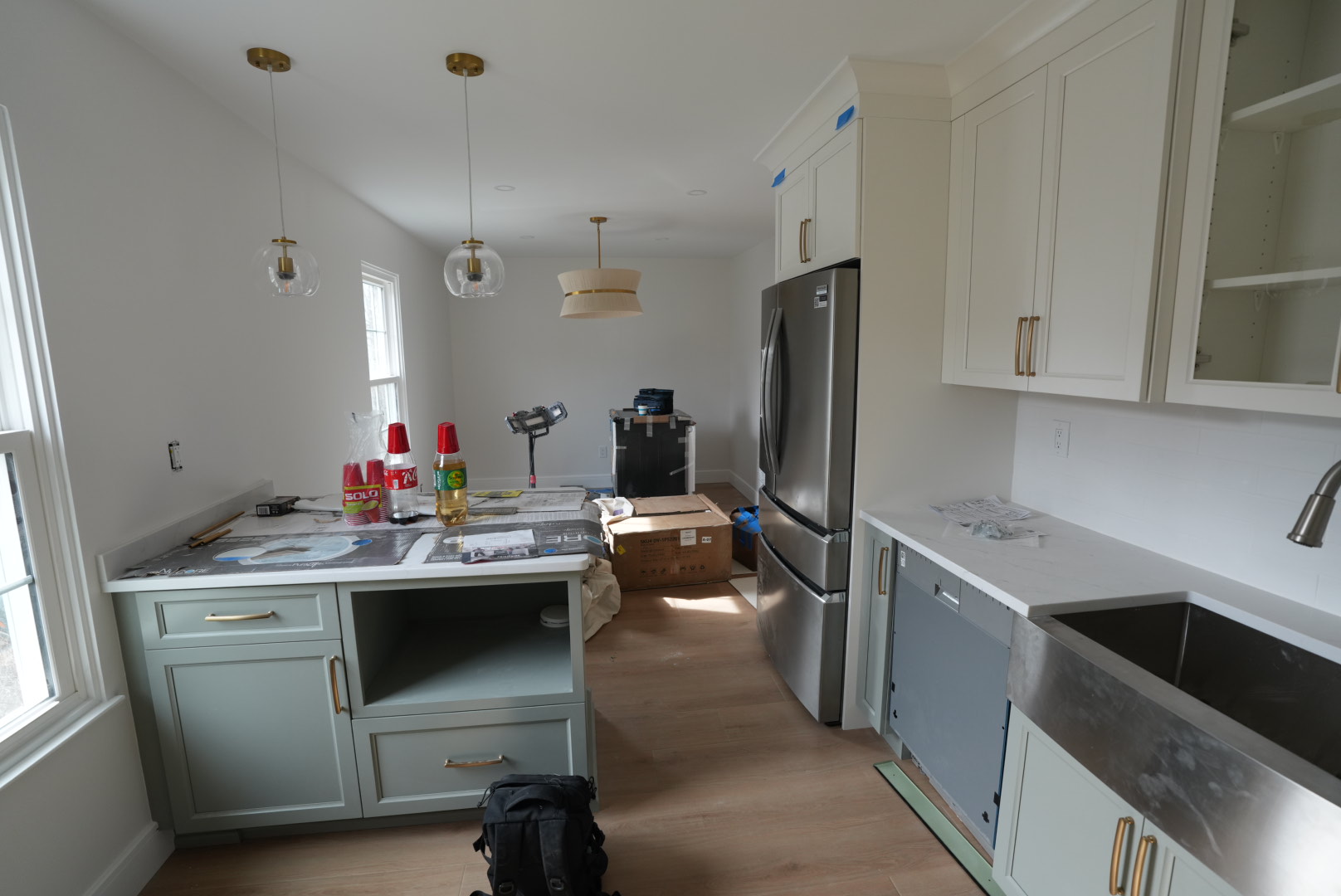 Scarsdale kitchen near completion with cabinetry, counters, lighting and finishes in progress