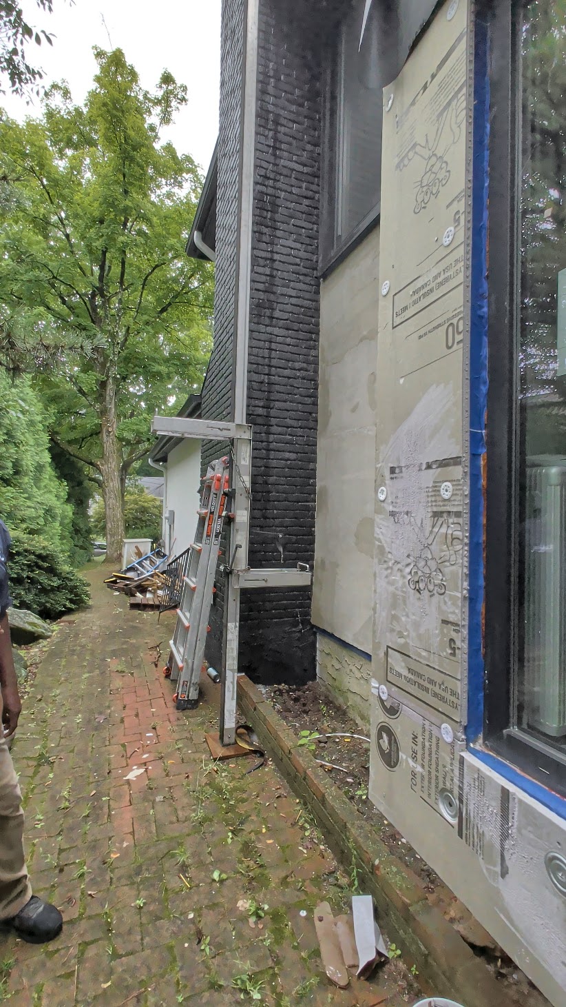 Real Kellets exterior insulation and water-control layer installation