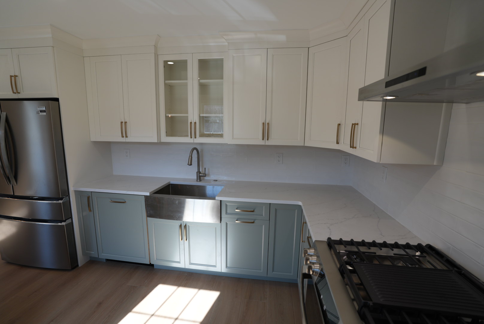 Completed Kellets kitchen with coordinated cabinetry and appliances