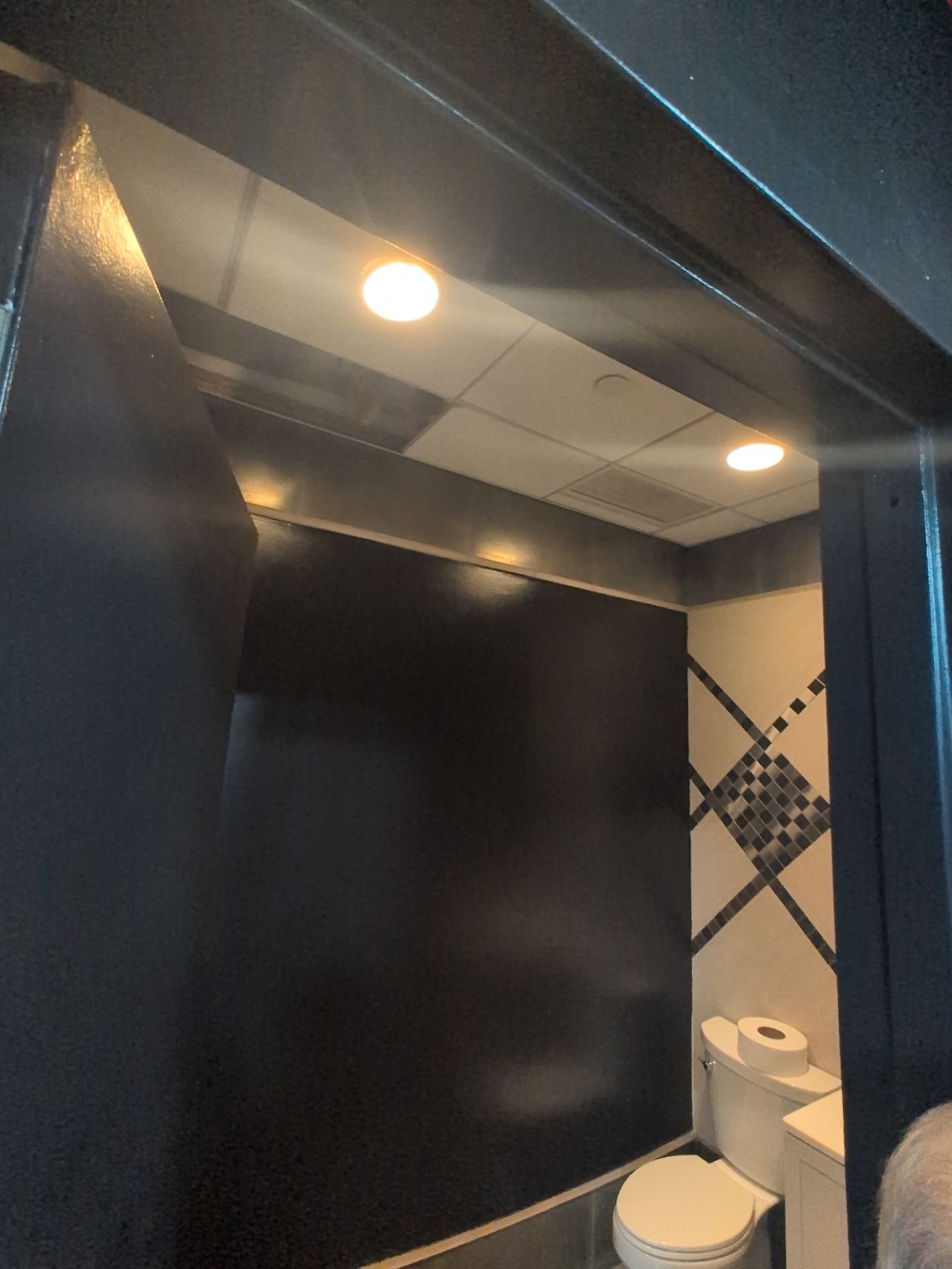 Commercial bathroom finish work documented during a Manhattan fitness renovation