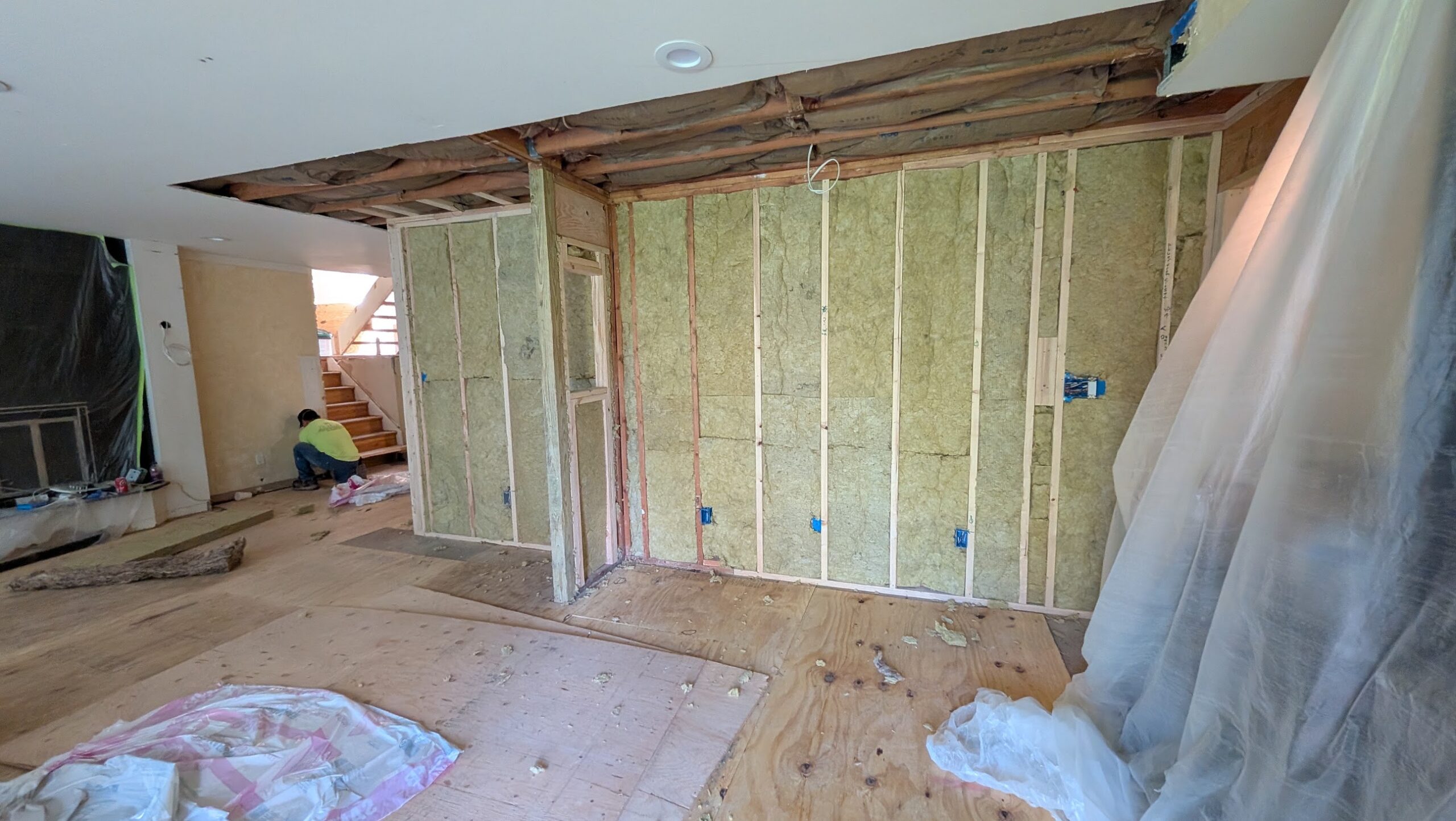 Insulation installed in an opened wall assembly during a Kellets renovation